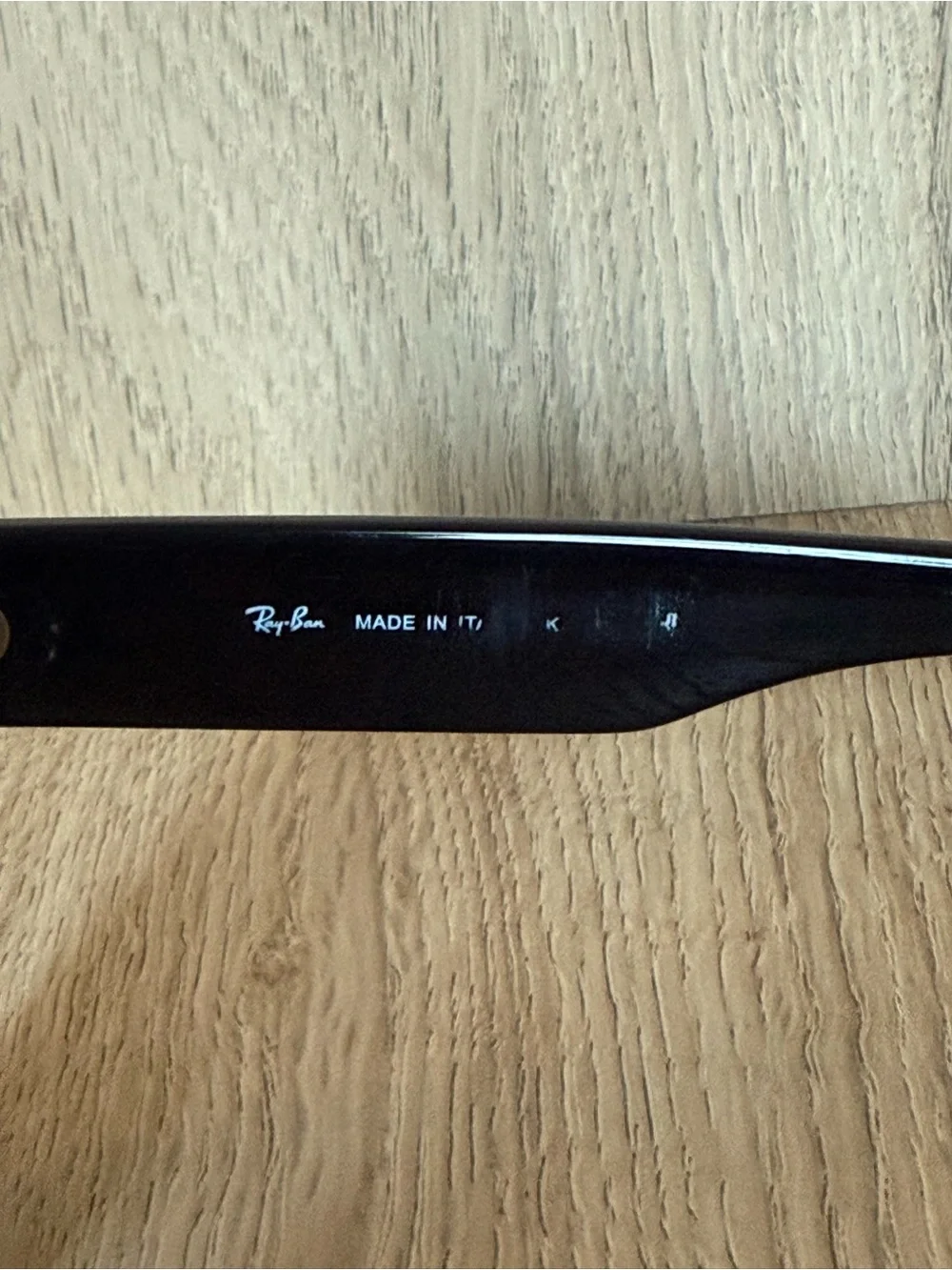Ray-Ban Black Frame Sunglasses with Dark Lenses